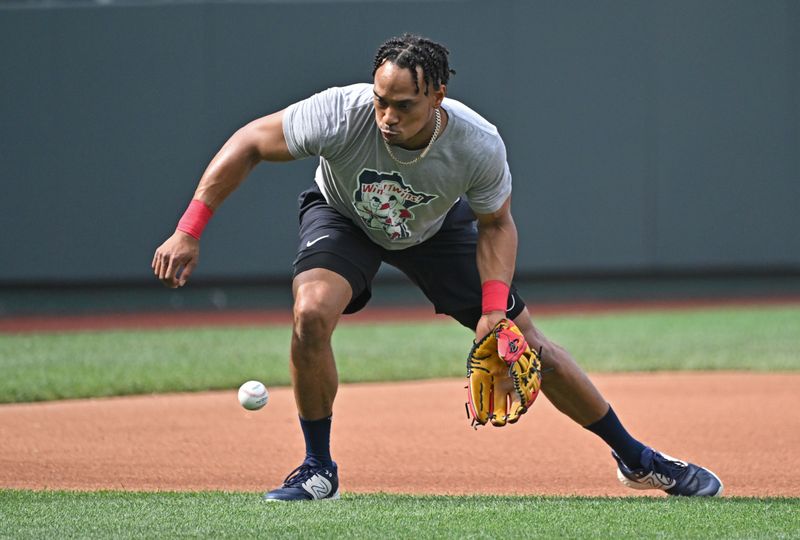 Jul 29, 2023; Kansas City, Missouri, USA; Minnesota Twins third baseman Jorge Polanco (11) fields a ground ball during batting practice before a game against the Kansas City Royals at Kauffman Stadium. Mandatory Credit: Peter Aiken-USA TODAY Sports