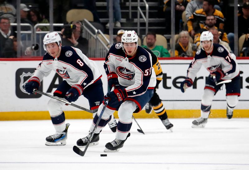 Mar 5, 2024; Pittsburgh, Pennsylvania, USA; Columbus Blue Jackets right wing Yegor Chinakhov (59) leads a breakout up ice against the Pittsburgh Penguins during the second period at PPG Paints Arena. The Penguins won 5-3. Mandatory Credit: Charles LeClaire-USA TODAY Sports