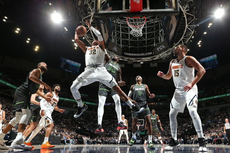 MINNEAPOLIS, MN -  NOVEMBER 1: Aaron Gordon #32 of the Denver Nuggets drives to the basket during the game against the Minnesota Timberwolves on November 1, 2024 at Target Center in Minneapolis, Minnesota. NOTE TO USER: User expressly acknowledges and agrees that, by downloading and or using this Photograph, user is consenting to the terms and conditions of the Getty Images License Agreement. Mandatory Copyright Notice: Copyright 2024 NBAE (Photo by David Sherman/NBAE via Getty Images)