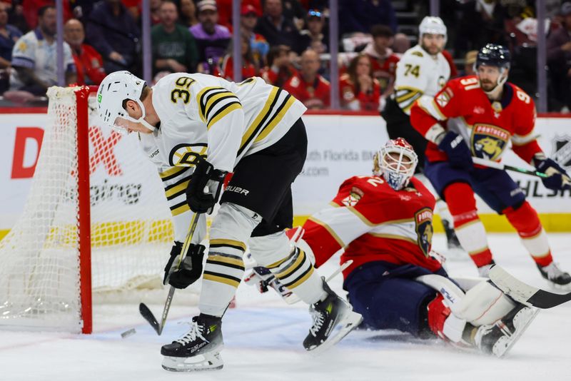 May 14, 2024; Sunrise, Florida, USA; Boston Bruins center Morgan Geekie (39) scores against Florida Panthers goaltender Sergei Bobrovsky (72) during the first period in game five of the second round of the 2024 Stanley Cup Playoffs at Amerant Bank Arena. Mandatory Credit: Sam Navarro-USA TODAY Sports