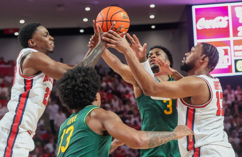 Feb 10, 2025; Houston, Texas, USA; Houston Cougars guard Terrance Arceneaux (23)  forward J'Wan Roberts (13),Baylor Bears guard Langston Love (13) and guard Jeremy Roach (3) reach for a rebound in the first half at Fertitta Center. Mandatory Credit: Thomas Shea-Imagn Images