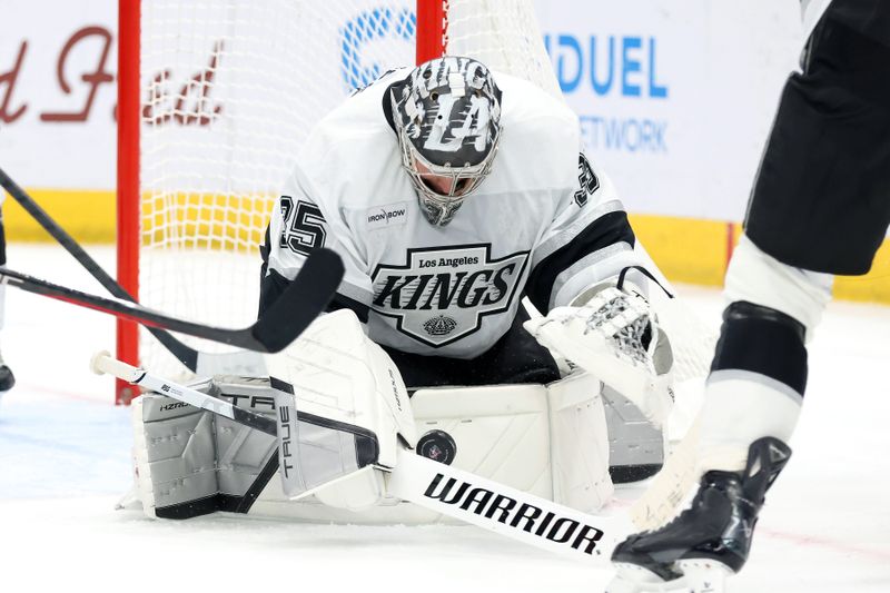 Jan 25, 2025; Columbus, Ohio, USA;  Los Angeles Kings goaltender Darcy Kuemper (35) saves the puck during the second period against the Columbus Blue Jackets at Nationwide Arena. Mandatory Credit: Joseph Maiorana-Imagn Images