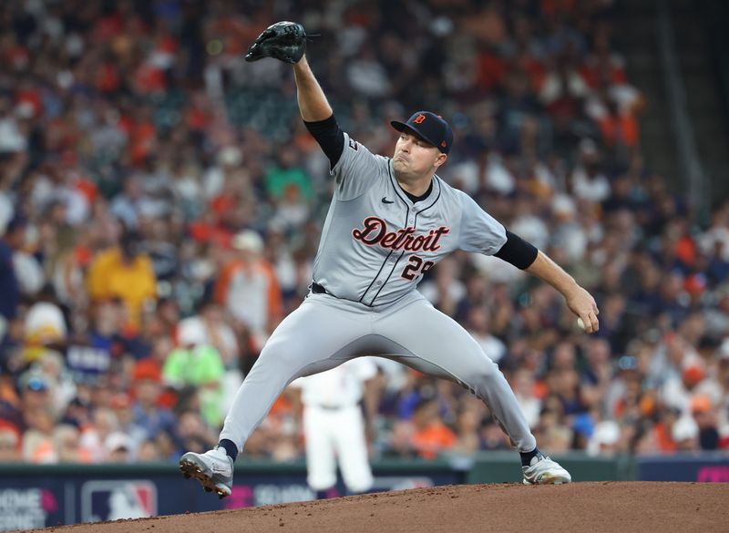 Oct 1, 2024; Houston, Texas, USA; Detroit Tigers pitcher Tarik Skubal (29) throws a pitch against the Houston Astros in the first inning in game one of the Wild Card round for the 2024 MLB Playoffs at Minute Maid Park. Mandatory Credit: Troy Taormina-Imagn Images