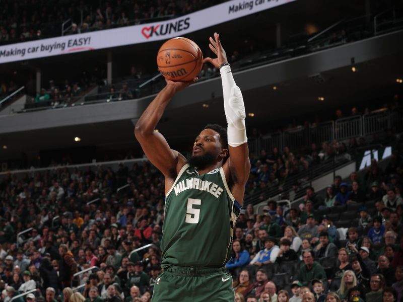 MILWAUKEE, WI - MARCH 24: Malik Beasley #5 of the Milwaukee Bucks shoots the ball during the game against the Oklahoma City Thunder on March 24, 2024 at the Fiserv Forum Center in Milwaukee, Wisconsin. NOTE TO USER: User expressly acknowledges and agrees that, by downloading and or using this Photograph, user is consenting to the terms and conditions of the Getty Images License Agreement. Mandatory Copyright Notice: Copyright 2024 NBAE (Photo by Gary Dineen/NBAE via Getty Images).