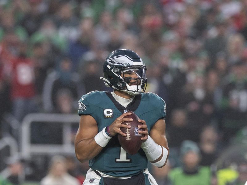 Philadelphia Eagles quarterback Jalen Hurts (1) drops back to pass against the San Francisco 49ers in an NFL football game, Sunday, Dec. 3, 2023, in Philadelphia, PA. 49ers defeat the Eagles 42-19. (AP Photo/Jeff Lewis)