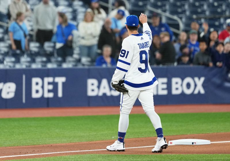 May 18, 2025; Toronto, Ontario, CAN; Toronto Blue Jays third baseman Ernie Clement (22) walks towards the dugout during batting practice before a game against the Detroit Tigers at Rogers Centre. Mandatory Credit: Nick Turchiaro-Imagn Images