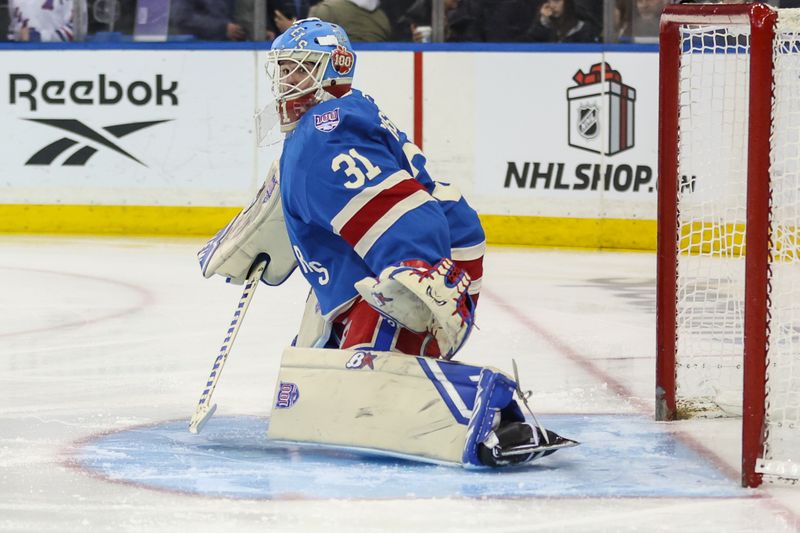 Dec 13, 2025; New York, New York, USA;  New York Rangers goaltender Igor Shesterkin (31) defends the net in the first period against the Montréal Canadiens at Madison Square Garden. Mandatory Credit: Wendell Cruz-Imagn Images