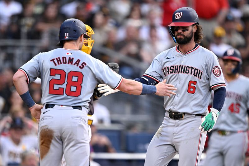 Jun 25, 2024; San Diego, California, USA; Washington Nationals left fielder Jesse Winker (6) is congratulated by right fielder Lane Thomas (28) after hitting a two-run home run against the San Diego Padres during the third inning at Petco Park. Mandatory Credit: Orlando Ramirez-USA TODAY Sports