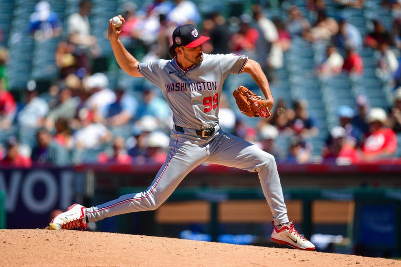 Jun 29, 2025; Anaheim, California, USA; Washington Nationals pitcher Cole Henry (99) throws against the Los Angeles Angels during the sixth inning at Angel Stadium. Mandatory Credit: Gary A. Vasquez-Imagn Images