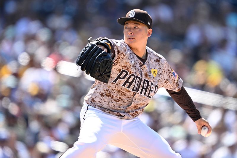 Jul 14, 2024; San Diego, California, USA; San Diego Padres relief pitcher Yuki Matsui (1) pitches against the Atlanta Braves during the ninth inning at Petco Park. Mandatory Credit: Orlando Ramirez-USA TODAY Sports