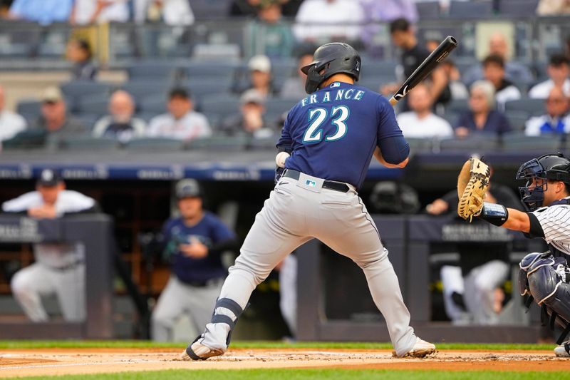 Jun 22, 2023; Bronx, New York, USA; Seattle Mariners first baseman Ty France (23) gets hit by a pitch against the New York Yankees during the first inning at Yankee Stadium. Mandatory Credit: Gregory Fisher-USA TODAY Sports