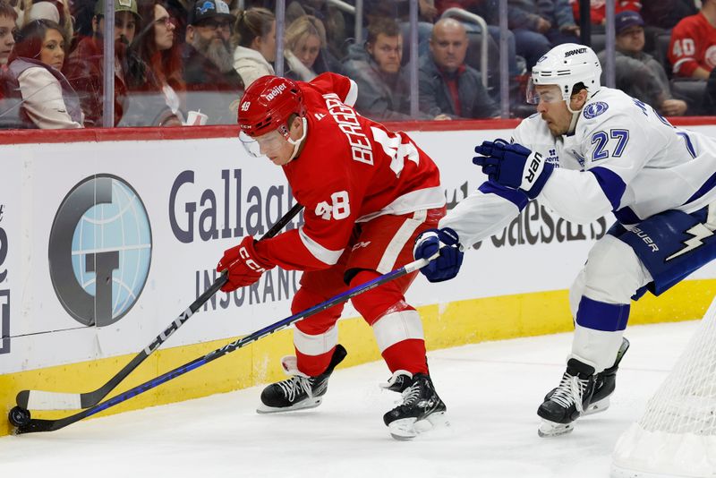 Jan 25, 2025; Detroit, Michigan, USA;  Detroit Red Wings right wing Jonatan Berggren (48) skates with the puck in the second period against the Tampa Bay Lightning at Little Caesars Arena. Mandatory Credit: Rick Osentoski-Imagn Images