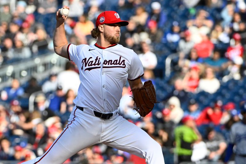 Apr 9, 2025; Washington, District of Columbia, USA; Washington Nationals pitcher Jake Irvin (27) throws to the Los Angeles Dodgers during the fifth inning at Nationals Park. Mandatory Credit: Brad Mills-Imagn Images