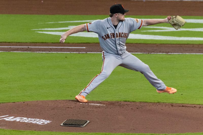 May 3, 2023; Houston, Texas, USA;  San Francisco Giants starting pitcher Logan Webb (62) throws against the Houston Astros in the third inning at Minute Maid Park. Mandatory Credit: Thomas Shea-USA TODAY Sports