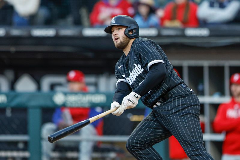 Apr 18, 2023; Chicago, Illinois, USA; Chicago White Sox first baseman Jake Burger (30) watches his three-run home run against the Philadelphia Phillies during the first inning of game two of the doubleheader at Guaranteed Rate Field. Mandatory Credit: Kamil Krzaczynski-USA TODAY Sports