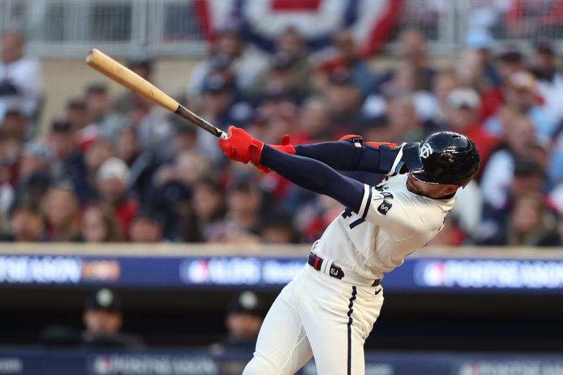 Oct 11, 2023; Minneapolis, Minnesota, USA; Minnesota Twins second baseman Edouard Julien (47) hits a double in the first inning against the Houston Astros during game four of the ALDS for the 2023 MLB playoffs at Target Field. Mandatory Credit: Jesse Johnson-USA TODAY Sports