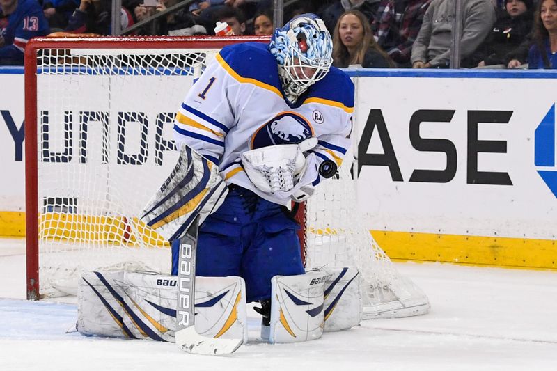 Dec 23, 2023; New York, New York, USA; Buffalo Sabres goaltender Ukko-Pekka Luukkonen (1) makes a save against the New York Rangers during the third period at Madison Square Garden. Mandatory Credit: Dennis Schneidler-USA TODAY Sports