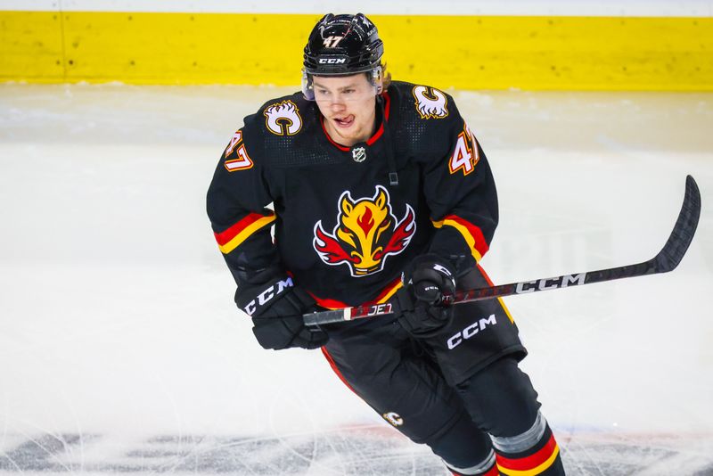 Jan 23, 2024; Calgary, Alberta, CAN; Calgary Flames center Connor Zary (47) skates during the warmup period against the St. Louis Blues at Scotiabank Saddledome. Mandatory Credit: Sergei Belski-USA TODAY Sports