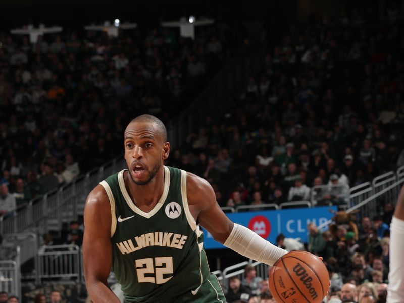 MILWAUKEE, WI - MARCH 24: Khris Middleton #22 of the Milwaukee Bucks handles the ball during the game against the Oklahoma City Thunder on March 24, 2024 at the Fiserv Forum Center in Milwaukee, Wisconsin. NOTE TO USER: User expressly acknowledges and agrees that, by downloading and or using this Photograph, user is consenting to the terms and conditions of the Getty Images License Agreement. Mandatory Copyright Notice: Copyright 2024 NBAE (Photo by Gary Dineen/NBAE via Getty Images).