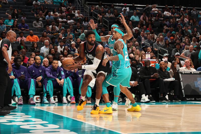 CHARLOTTE, NC - MARCH 31: Paul George #13 of the LA Clippers handles the ball during the game against the Charlotte Hornets on March 31, 2024 at Spectrum Center in Charlotte, North Carolina. NOTE TO USER: User expressly acknowledges and agrees that, by downloading and or using this photograph, User is consenting to the terms and conditions of the Getty Images License Agreement. Mandatory Copyright Notice: Copyright 2024 NBAE (Photo by Kent Smith/NBAE via Getty Images)