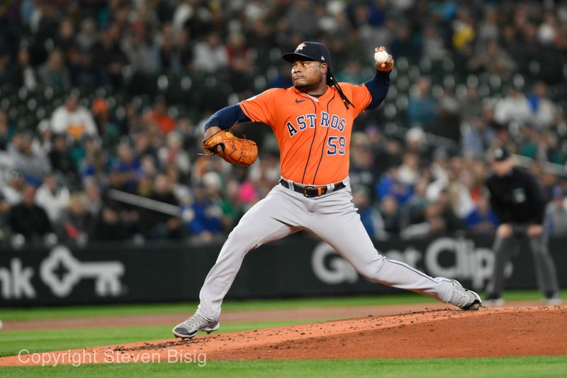 Sep 27, 2023; Seattle, Washington, USA; Houston Astros starting pitcher Framber Valdez (59) pitches to the Seattle Mariners during the first inning at T-Mobile Park. Mandatory Credit: Steven Bisig-USA TODAY Sports