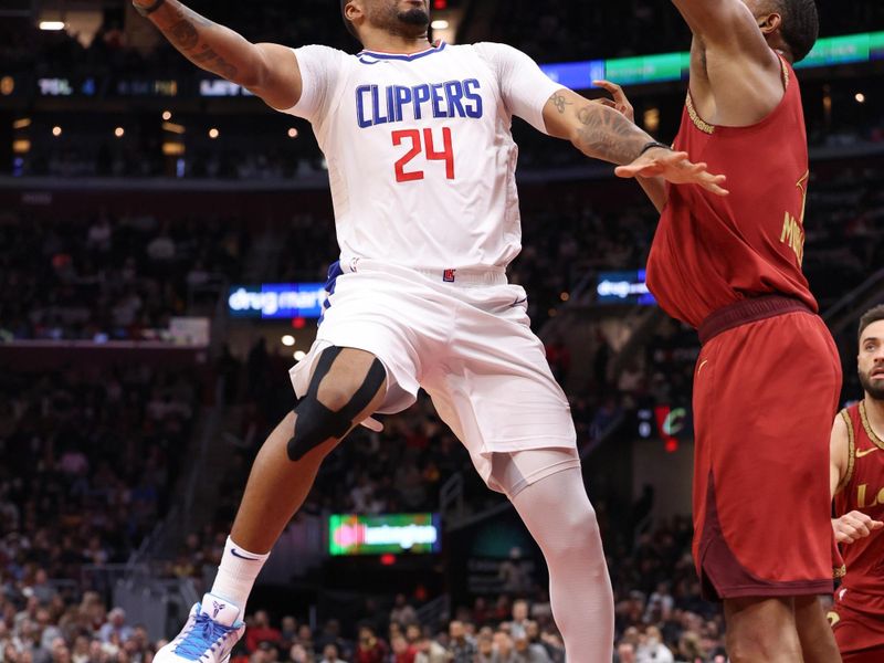 CLEVELAND, OH - JANUARY 29:  Norman Powell #24 of the LA Clippers goes to the basket during the game on January 29, 2024 at Rocket Mortgage FieldHouse in Cleveland, Ohio. NOTE TO USER: User expressly acknowledges and agrees that, by downloading and/or using this Photograph, user is consenting to the terms and conditions of the Getty Images License Agreement. Mandatory Copyright Notice: Copyright 2024 NBAE (Photo by  Lauren Leigh Bacho/NBAE via Getty Images)