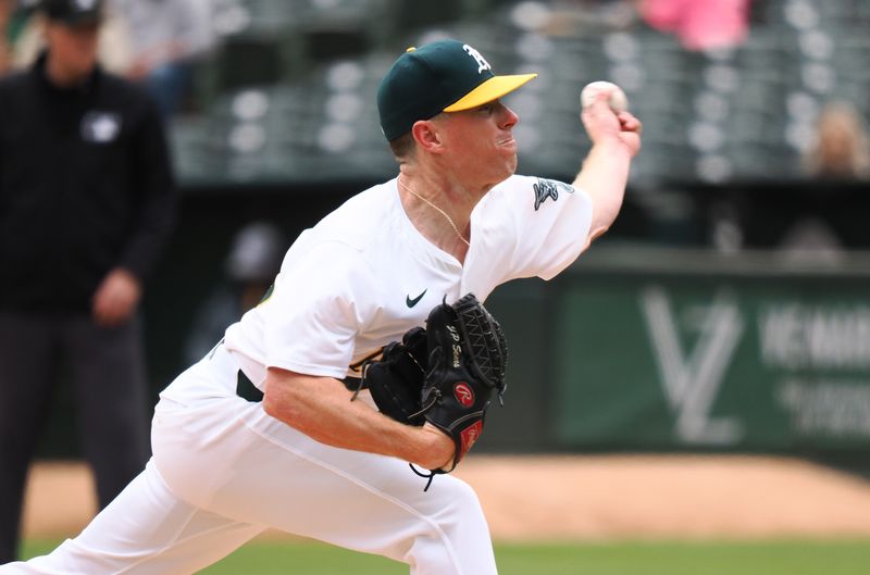 May 25, 2024; Oakland, California, USA; Oakland Athletics starting pitcher JP Sears (38) pitches the ball against the Houston Astros during the first inning at Oakland-Alameda County Coliseum. Mandatory Credit: Kelley L Cox-USA TODAY Sports