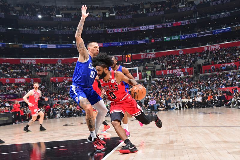 LOS ANGELES, CA - MARCH 9: Coby White #0 of the Chicago Bulls dribbles the ball during the game against the LA Clippers on March 9, 2024 at Crypto.Com Arena in Los Angeles, California. NOTE TO USER: User expressly acknowledges and agrees that, by downloading and/or using this Photograph, user is consenting to the terms and conditions of the Getty Images License Agreement. Mandatory Copyright Notice: Copyright 2024 NBAE (Photo by Adam Pantozzi/NBAE via Getty Images)