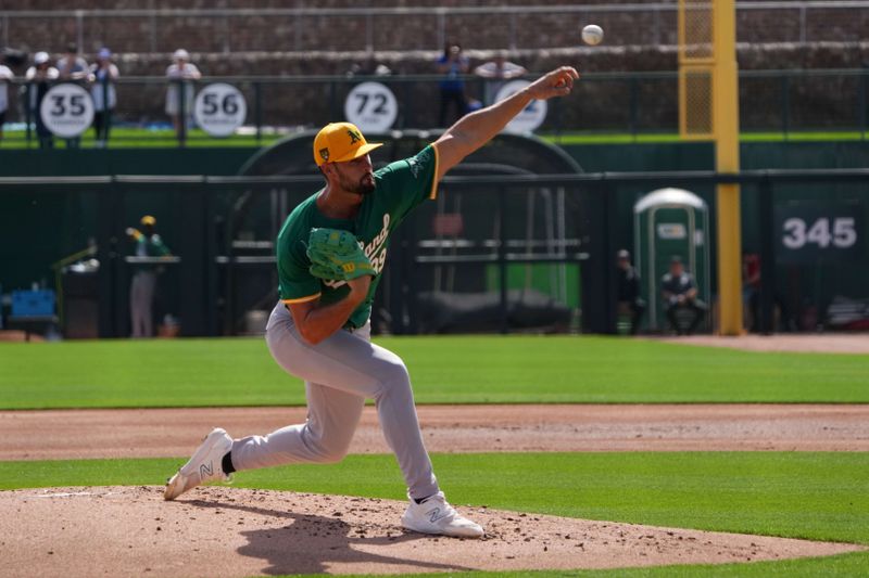 Feb 25, 2024; Phoenix, Arizona, USA; Oakland Athletics starting pitcher Kyle Muller (39) pitches against the Los Angeles Dodgers during the first inning at Camelback Ranch-Glendale. Mandatory Credit: Joe Camporeale-USA TODAY Sports