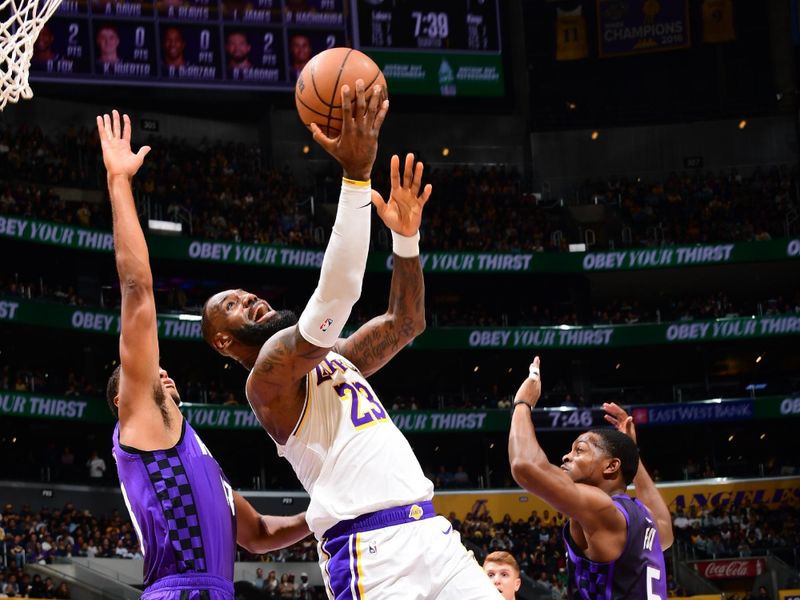 LOS ANGELES, CA - OCTOBER 26: LeBron James #23 of the Los Angeles Lakers drives to the basket during the game against the Sacramento Kings on October 26, 2024 at Crypto.Com Arena in Los Angeles, California. NOTE TO USER: User expressly acknowledges and agrees that, by downloading and/or using this Photograph, user is consenting to the terms and conditions of the Getty Images License Agreement. Mandatory Copyright Notice: Copyright 2024 NBAE (Photo by Adam Pantozzi/NBAE via Getty Images)