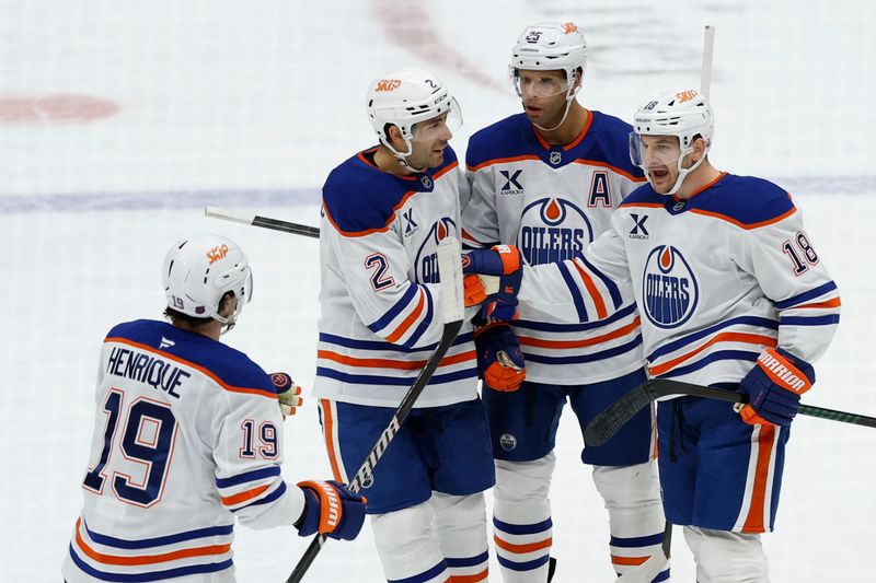 Nov 19, 2025; Washington, District of Columbia, USA; Edmonton Oilers defenseman Darnell Nurse (25) celebrates with teammates after scoring a goal against the Washington Capitals during the first period at Capital One Arena. Mandatory Credit: Geoff Burke-Imagn Images