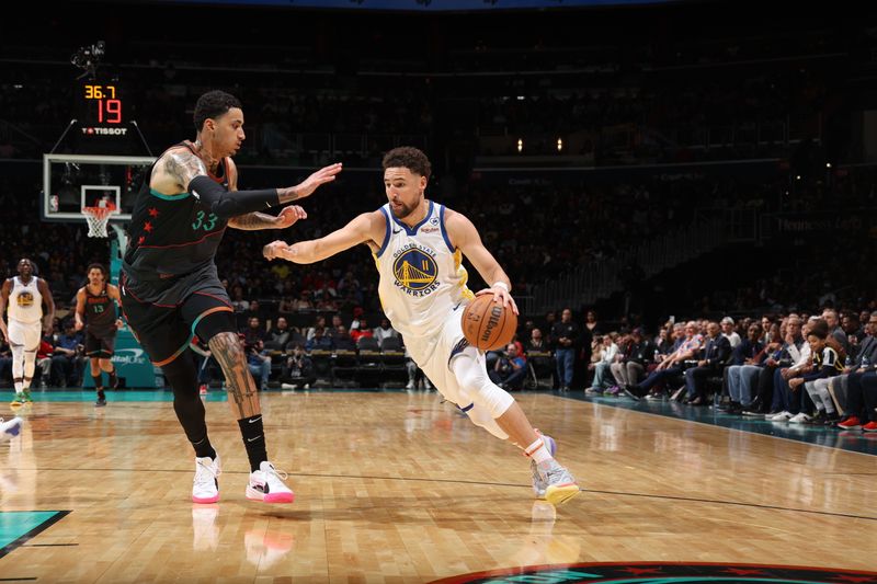 WASHINGTON, DC -? FEBRUARY 27: Klay Thompson #11 of the Golden State Warriors drives to the basket against Kyle Kuzma #33 of the Washington Wizards during the game on February 27, 2024 at Capital One Arena in Washington, DC. NOTE TO USER: User expressly acknowledges and agrees that, by downloading and or using this Photograph, user is consenting to the terms and conditions of the Getty Images License Agreement. Mandatory Copyright Notice: Copyright 2024 NBAE (Photo by Stephen Gosling/NBAE via Getty Images)