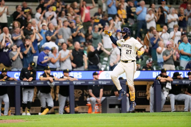 Jul 10, 2024; Milwaukee, Wisconsin, USA;  Milwaukee Brewers shortstop Willy Adames (27) celebrates after hitting a home run during the eighth inning against the Pittsburgh Pirates at American Family Field. Mandatory Credit: Jeff Hanisch-USA TODAY Sports