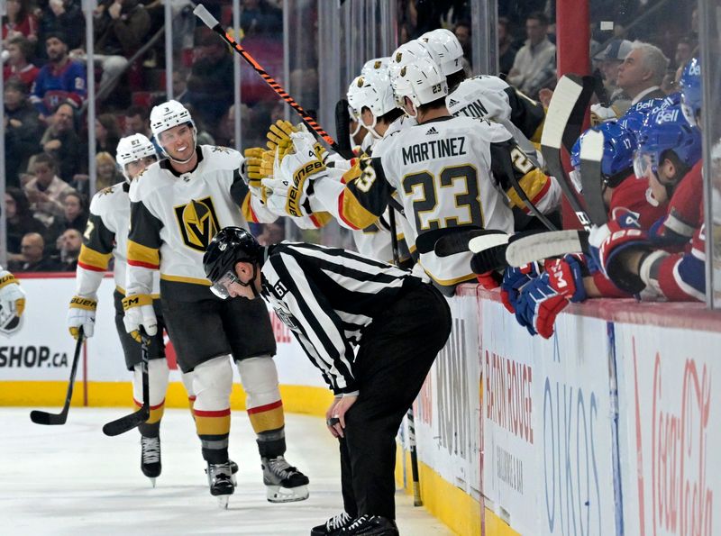 Nov 16, 2023; Montreal, Quebec, CAN; Vegas Golden Knights defenseman Brayden McNabb (3) celebrates with teammates after scoring a goal against the Montreal Canadiens during the second period at the Bell Centre. Mandatory Credit: Eric Bolte-USA TODAY Sports