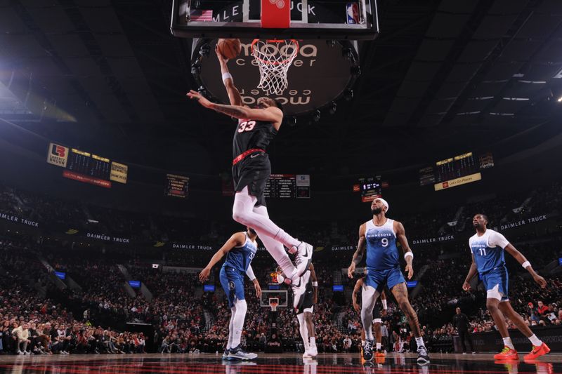 PORTLAND, OR - FEBRUARY 15: Toumani Camara #33 of the Portland Trail Blazers drives to the basket during the game against the Minnesota Timberwolves on February 15, 2024 at the Moda Center Arena in Portland, Oregon. NOTE TO USER: User expressly acknowledges and agrees that, by downloading and or using this photograph, user is consenting to the terms and conditions of the Getty Images License Agreement. Mandatory Copyright Notice: Copyright 2024 NBAE (Photo by Cameron Browne/NBAE via Getty Images)