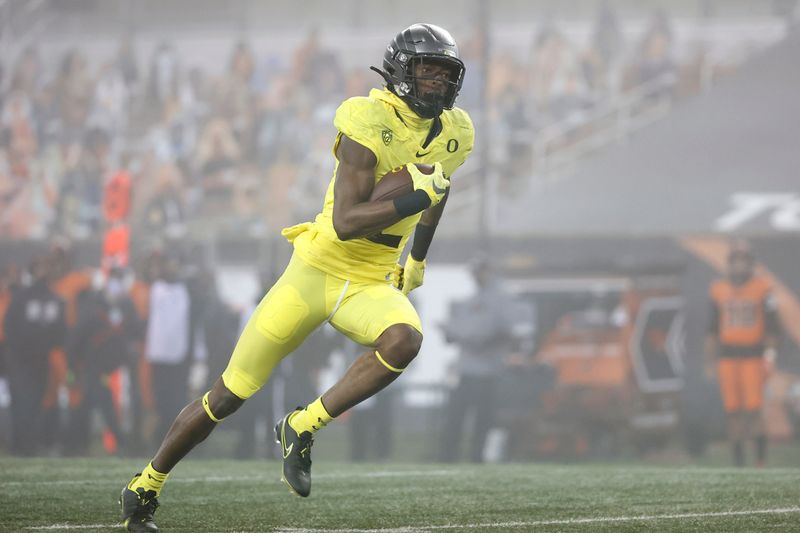 Nov 27, 2020; Corvallis, Oregon, USA; Oregon Ducks  wide receiver Devon Williams (2) runs the ball for a touchdown against the Oregon State Beavers during the first half at Reser Stadium. Mandatory Credit: Soobum Im-USA TODAY Sports