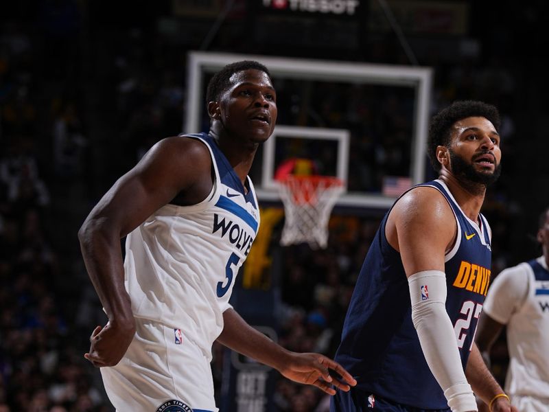 DENVER, CO - APRIL 10: Anthony Edwards #5 of the Minnesota Timberwolves and Jamal Murray #27 of the Denver Nuggets look on during the game on April 10, 2024 at the Ball Arena in Denver, Colorado. NOTE TO USER: User expressly acknowledges and agrees that, by downloading and/or using this Photograph, user is consenting to the terms and conditions of the Getty Images License Agreement. Mandatory Copyright Notice: Copyright 2024 NBAE (Photo by Bart Young/NBAE via Getty Images)