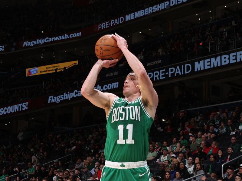 WASHINGTON, DC -? MARCH 17: Payton Pritchard #11 of the Boston Celtics shoots a three point basket against the Washington Wizards on March 17, 2024 at Capital One Arena in Washington, DC. NOTE TO USER: User expressly acknowledges and agrees that, by downloading and or using this Photograph, user is consenting to the terms and conditions of the Getty Images License Agreement. Mandatory Copyright Notice: Copyright 2024 NBAE (Photo by Stephen Gosling/NBAE via Getty Images)