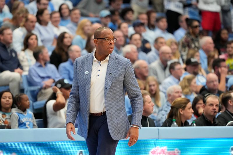 Dec 2, 2023; Chapel Hill, North Carolina, USA;  North Carolina Tar Heels head coach Hubert Davis reacts in the first half at Dean E. Smith Center. Mandatory Credit: Bob Donnan-USA TODAY Sports