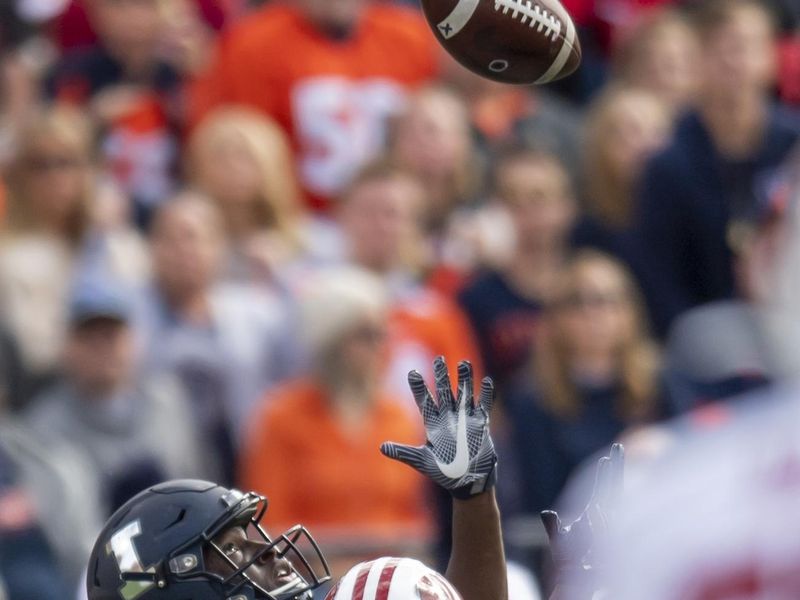 Oct 19, 2019; Champaign, IL, USA; Illinois Fighting Illini wide receiver Josh Imatorbhebhe (9) receives a pass for a touchdown, that is later overturned, during the first half against the Wisconsin Badgers at Memorial Stadium. Mandatory Credit: Patrick Gorski-USA TODAY Sports