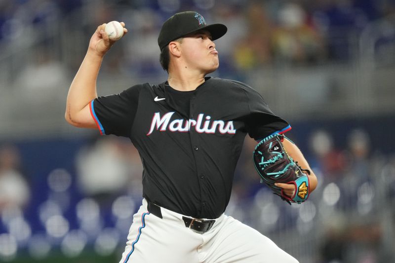 Sep 20, 2024; Miami, Florida, USA;  Miami Marlins pitcher Valente Bellozo (83) pitches against the Atlanta Braves in the first inning at loanDepot Park. Mandatory Credit: Jim Rassol-Imagn Images