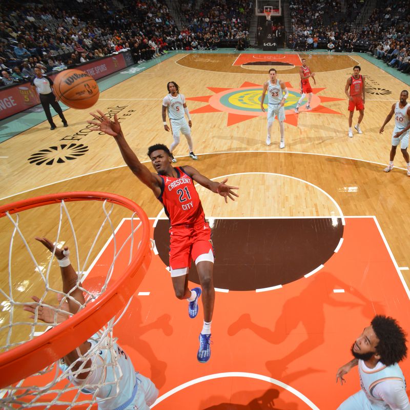 SAN ANTONIO, TX - DECEMBER 8: Yves Missi #21 of the New Orleans Pelicans drives to the basket during the game against the San Antonio Spurs on December 8, 2024 at the Frost Bank Center in San Antonio, Texas. NOTE TO USER: User expressly acknowledges and agrees that, by downloading and or using this photograph, user is consenting to the terms and conditions of the Getty Images License Agreement. Mandatory Copyright Notice: Copyright 2024 NBAE (Photos by Jesse D. Garrabrant/NBAE via Getty Images)