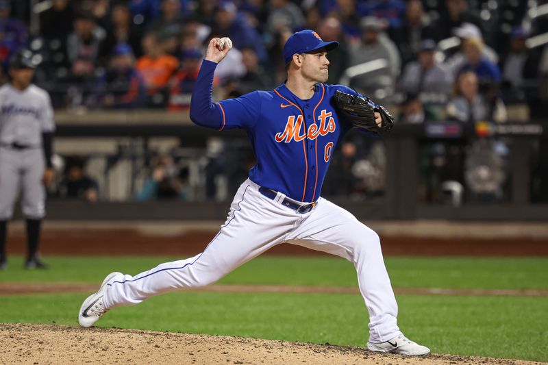 Sep 27, 2023; New York, NY, USA; New York Mets relief pitcher Adam Ottavino (0) delivers a pitch during the ninth inning against the Miami Marlins at Citi Field.  Mandatory Credit: Vincent Carchietta-USA TODAY Sports