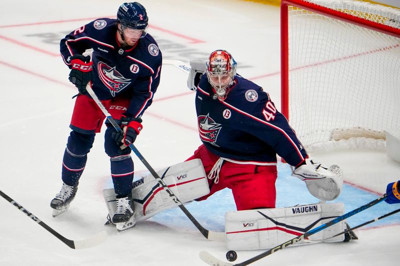 Oct 17, 2024; Columbus, Ohio, USA; Columbus Blue Jackets goaltender Daniil Tarasov (40) blocks a shot against the Buffalo Sabres in the second period at Nationwide Arena on Thursday.  Mandatory Credit: Samantha Madar/USA TODAY Network via Imagn Images