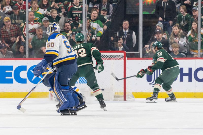 Apr 8, 2023; Saint Paul, Minnesota, USA; Minnesota Wild right wing Ryan Hartman (38) scores a short handed goal in the first period against the St. Louis Blues at Xcel Energy Center. Mandatory Credit: Matt Blewett-USA TODAY Sports