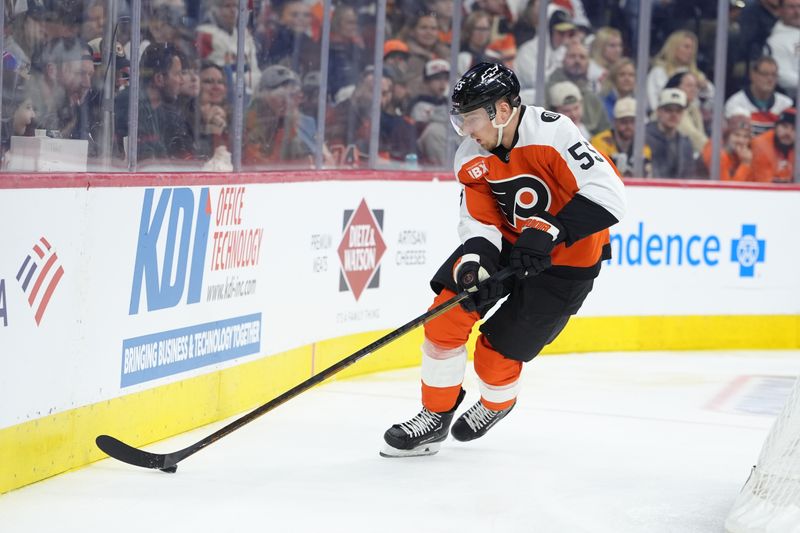Feb 28, 2026; Philadelphia, Pennsylvania, USA; Philadelphia Flyers defenseman Rasmus Ristolainen (55) controls the puck against the Boston Bruins in the first period at Xfinity Mobile Arena. Mandatory Credit: Kyle Ross-Imagn Images