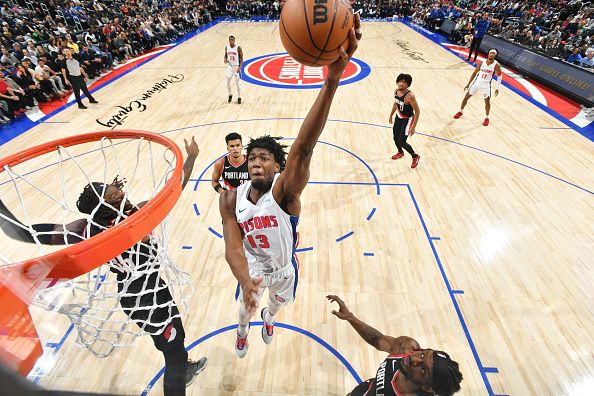 DETROIT, MI - NOVEMBER 1: James Wiseman #13 of the Detroit Pistons drives to the basket during the game against the Portland Trail Blazers on November 1, 2023 at Little Caesars Arena in Detroit, Michigan. NOTE TO USER: User expressly acknowledges and agrees that, by downloading and/or using this photograph, User is consenting to the terms and conditions of the Getty Images License Agreement. Mandatory Copyright Notice: Copyright 2023 NBAE (Photo by Chris Schwegler/NBAE via Getty Images)