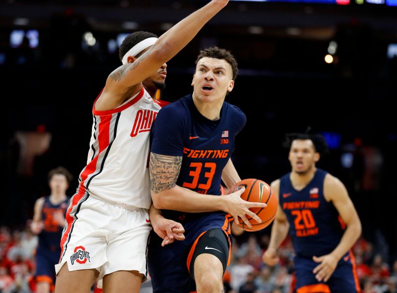 Feb 26, 2023; Columbus, Ohio, USA; Illinois Fighting Illini forward Coleman Hawkins (33) drives in for the score as Ohio State Buckeyes guard Roddy Gayle Jr. (1) defends during the first half at Value City Arena. Mandatory Credit: Joseph Maiorana-USA TODAY Sports