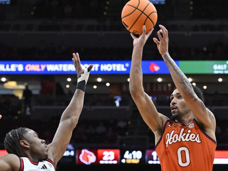 Jan 24, 2026; Louisville, Kentucky, USA;  Virginia Tech Hokies guard Jailen Bedford (0) shoots against Louisville Cardinals guard Adrian Wooley (14) during the first half at KFC Yum! Center. Mandatory Credit: Jamie Rhodes-Imagn Images