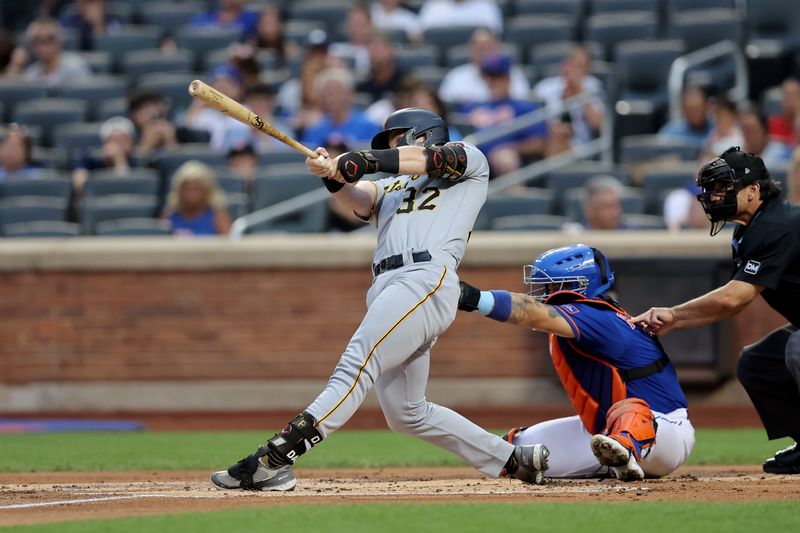 Aug 14, 2023; New York City, New York, USA; Pittsburgh Pirates right fielder Henry Davis (32) follows through on an RBI single against the New York Mets during the first inning at Citi Field. Mandatory Credit: Brad Penner-USA TODAY Sports